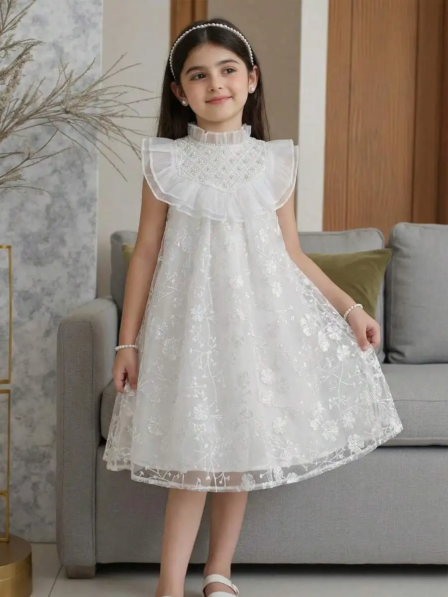 White Embroidered Ruffle Hem A-Line Dress With High Neckline And Floral Pattern
White Embroidered Ruffle Hem A-Line Dress With High Neckline And Floral Pattern