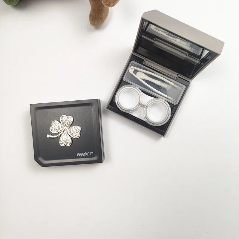 Inlaid Rhinestone Four leave decoration Contact Lens Case Portable Travel Contact Lens Storage Box Mini Contact Lenses Case B1
Inlaid Rhinestone Four leave decoration Contact Lens Case Portable Travel Contact Lens Storage Box Mini Contact Lenses Case B1