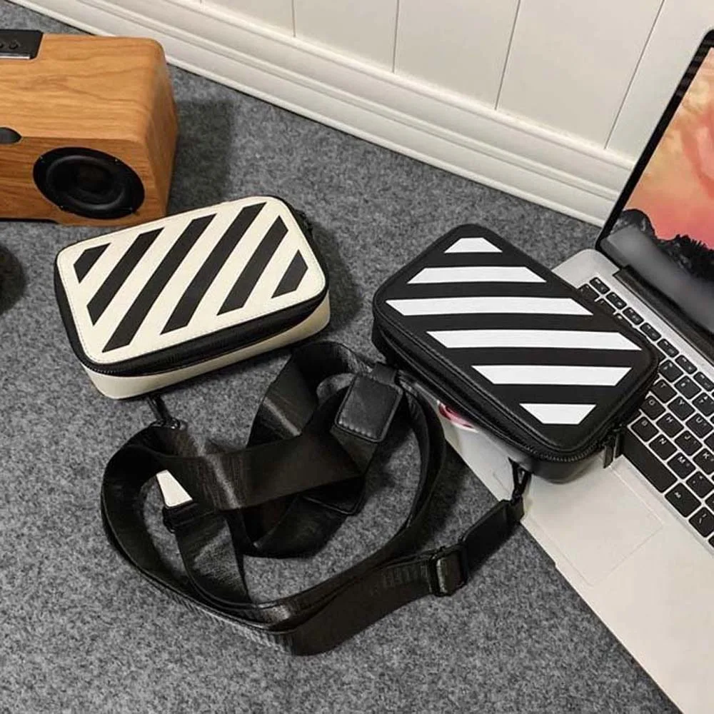 Fashion Stripe Handbag PU Leather Shoulder Bag Korean Style White Black Couple Outdoor Purse Bag Casual INS Messenger Bag Couple
Fashion Stripe Handbag PU Leather Shoulder Bag Korean Style White Black Couple Outdoor Purse Bag Casual INS Messenger Bag Couple