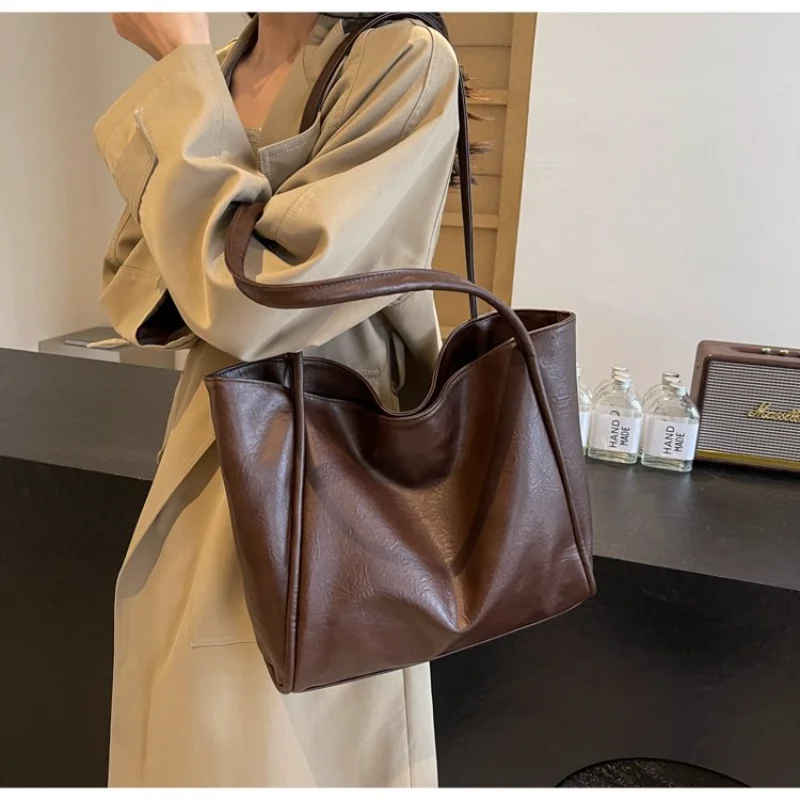 Neutral Style Brown Soft Leather Tote Bag, Simple Hobo Design, Wide Shoulder Strap, Spacious Casual Purse for Daily Use Handbags
Neutral Style Brown Soft Leather Tote Bag, Simple Hobo Design, Wide Shoulder Strap, Spacious Casual Purse for Daily Use Handbags