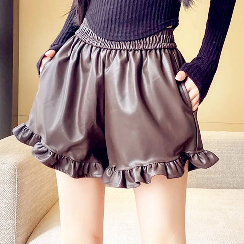 Осень-зима, новые эластичные брюки из искусственной кожи с высокой талией, широкие брюки трапециевидной формы, шорты с карманами и оборками, карманы
Осень-зима, новые эластичные брюки из искусственной кожи с высокой талией, широкие брюки трапециевидной формы, шорты с карманами и оборками, карманы