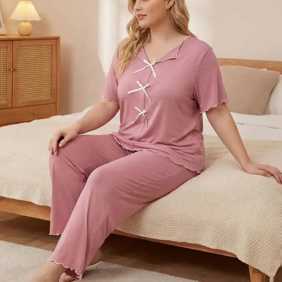 Women Plus Size Pink Short Sleeve Pajama Set With Bow Detail Top And Pants Loungewear
Women Plus Size Pink Short Sleeve Pajama Set With Bow Detail Top And Pants Loungewear