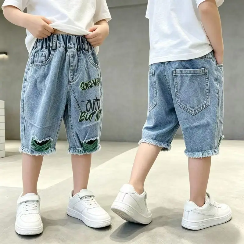 Fashion Kids Boy Knee-Length Ripped Denim Shorts Raw Hem Streetwear Summer Jeans with Letters Children's Stylish Casual Shorts
Fashion Kids Boy Knee-Length Ripped Denim Shorts Raw Hem Streetwear Summer Jeans with Letters Children's Stylish Casual Shorts