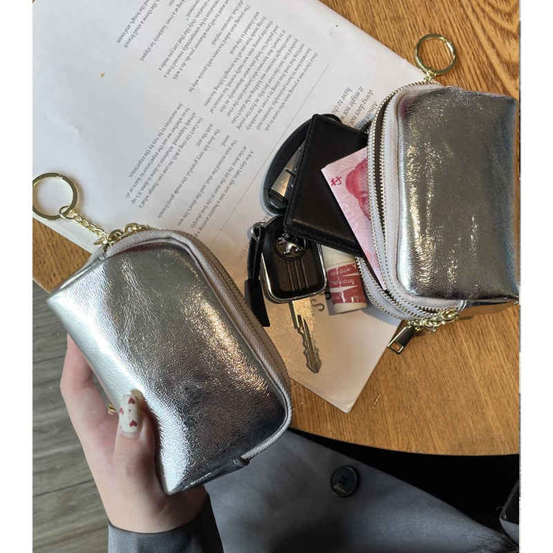 Большой кожаный кошелек для монет с тремя молниями, многослойный брелок для ключей, сумка для хранения водительских прав, женская модная серебряная сумка
Большой кожаный кошелек для монет с тремя молниями, многослойный брелок для ключей, сумка для хранения водительских прав, женская модная серебряная сумка