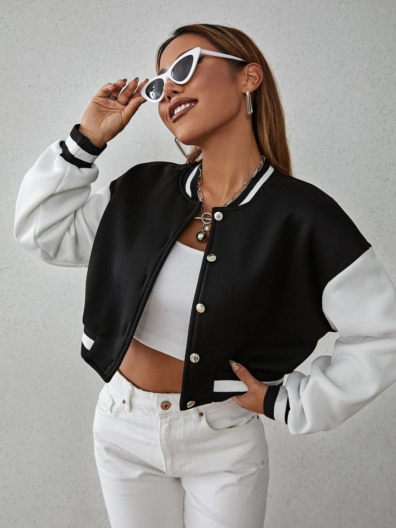 Women's Drop Shoulder Dual-Tone Short Bomber Jacket with Ribbed Trim and Snap Buttons
Women's Drop Shoulder Dual-Tone Short Bomber Jacket with Ribbed Trim and Snap Buttons