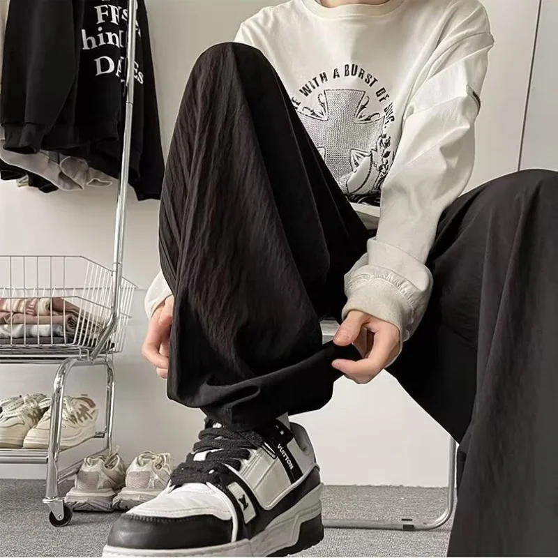 Летние тонкие брюки из ледяного шелка, мужские повседневные брюки, свободные и ленивые брюки Yamamoto, пара прямых широких брюк
Летние тонкие брюки из ледяного шелка, мужские повседневные брюки, свободные и ленивые брюки Yamamoto, пара прямых широких брюк