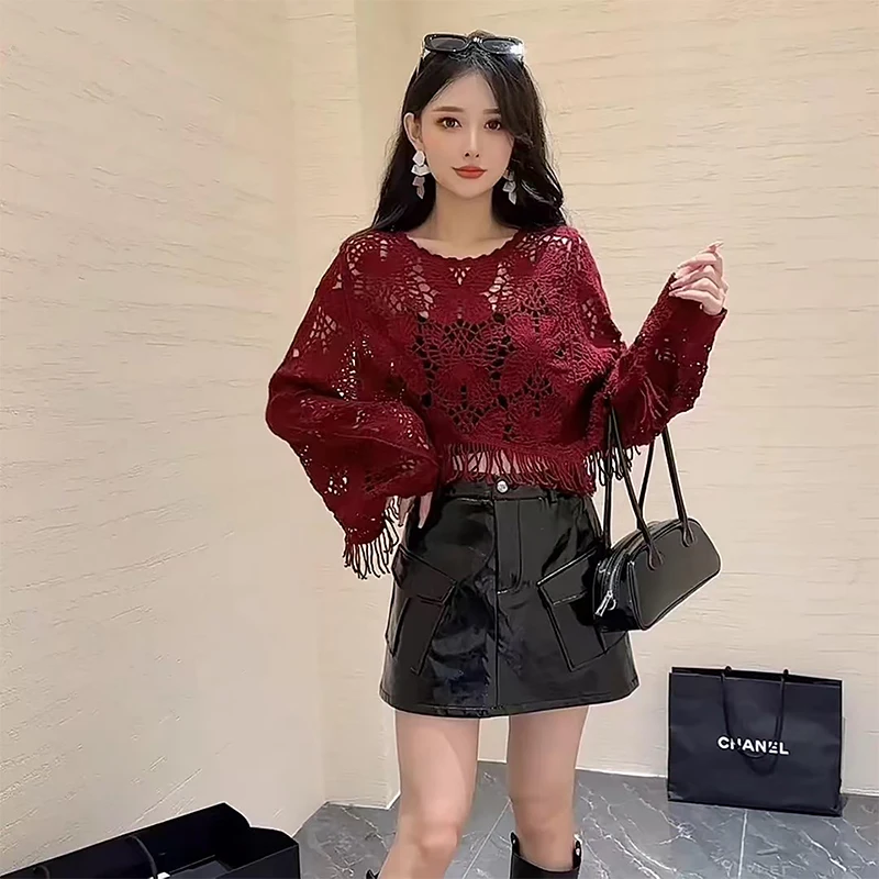 Женский свободный вязаный свитер с длинными рукавами и полой вышивкой в стиле ретро с короткими кисточками 
Женский свободный вязаный свитер с длинными рукавами и полой вышивкой в стиле ретро с короткими кисточками