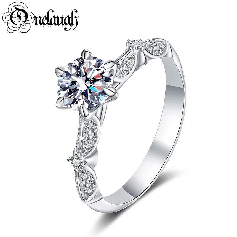Onelaugh Classic 1ct Round Moissanite Engagement Ring 18K Gold Plated Sterling Silver Wedding Band Rings for Women Fine Jewelry
Onelaugh Classic 1ct Round Moissanite Engagement Ring 18K Gold Plated Sterling Silver Wedding Band Rings for Women Fine Jewelry