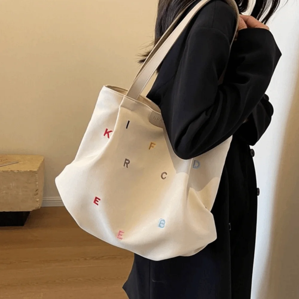 Casual Embroidery Letter Handbag Inner Pocket Simple Elegant Shoulder Bag Portable Single Shoulder Student Tote Bag
Casual Embroidery Letter Handbag Inner Pocket Simple Elegant Shoulder Bag Portable Single Shoulder Student Tote Bag