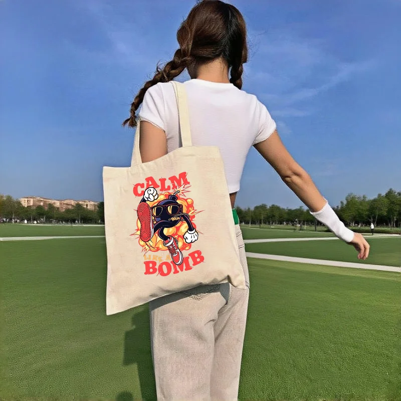 1pc Funny Calm Like A Bomb Cartoon Character Canvas Tote Bag Double Print Edgy Trend Large Capacity Daily Shoulder Bag
1pc Funny Calm Like A Bomb Cartoon Character Canvas Tote Bag Double Print Edgy Trend Large Capacity Daily Shoulder Bag