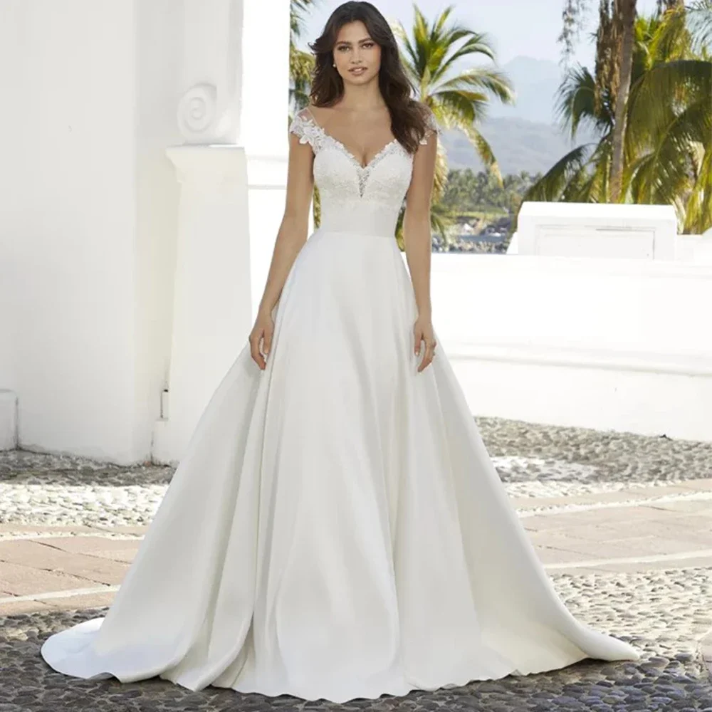 Elegant Cap Sleeves Short Sleeve Wedding Dress V-Neck Applique A-Line Floor Length Satin Bridal Backless with Buttons Gowns
Elegant Cap Sleeves Short Sleeve Wedding Dress V-Neck Applique A-Line Floor Length Satin Bridal Backless with Buttons Gowns