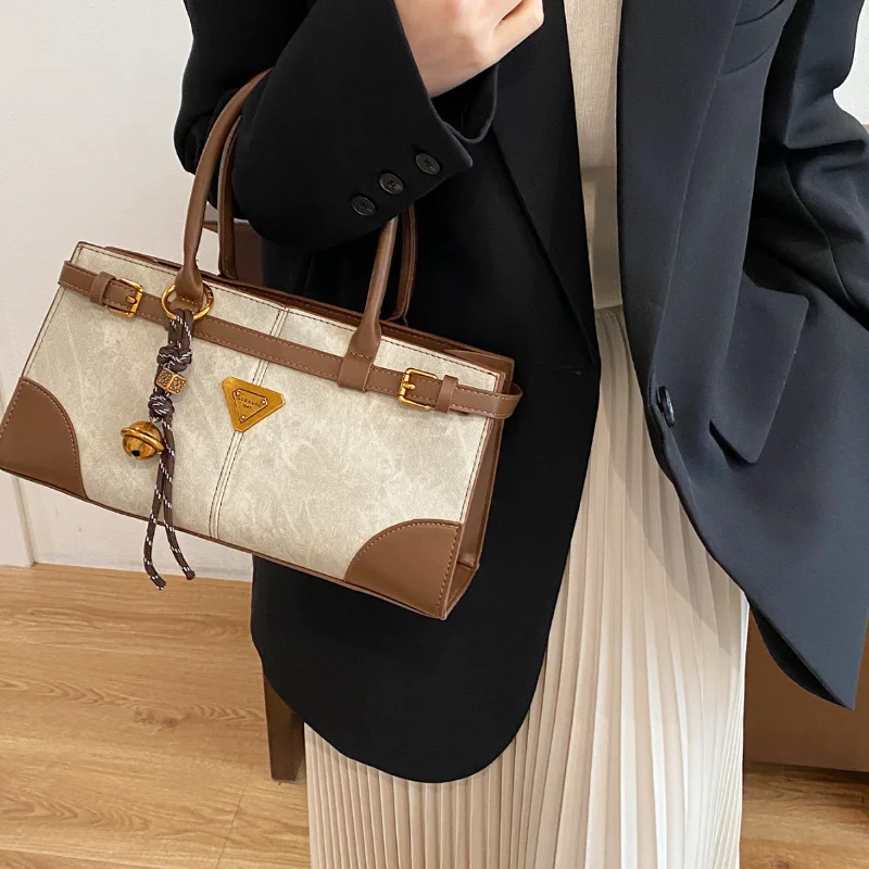 Зимний винтажный портфель 2025 года для женщин, регулируемый ремень через плечо, кошелек с верхней ручкой, рабочая сумка в корейском стиле
Зимний винтажный портфель 2025 года для женщин, регулируемый ремень через плечо, кошелек с верхней ручкой, рабочая сумка в корейском стиле