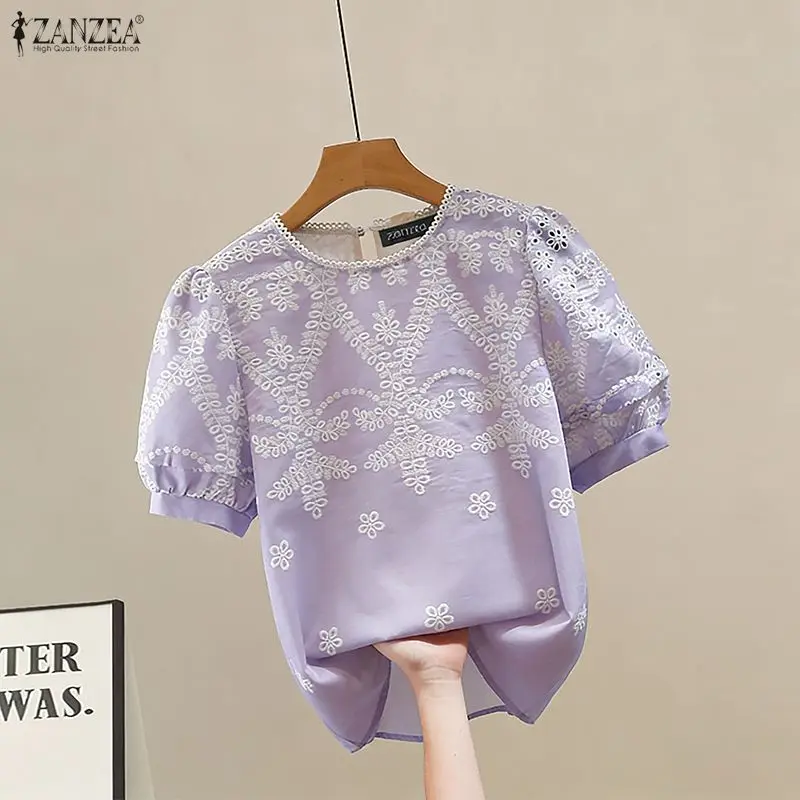 ZANZEA винтажные топы, блузка с коротким рукавом, женская летняя кружевная лоскутная рубашка с круглым вырезом и цветочным принтом, 2026, модные повседневные свободные блузки
ZANZEA винтажные топы, блузка с коротким рукавом, женская летняя кружевная лоскутная рубашка с круглым вырезом и цветочным принтом, 2026, модные повседневные свободные блузки