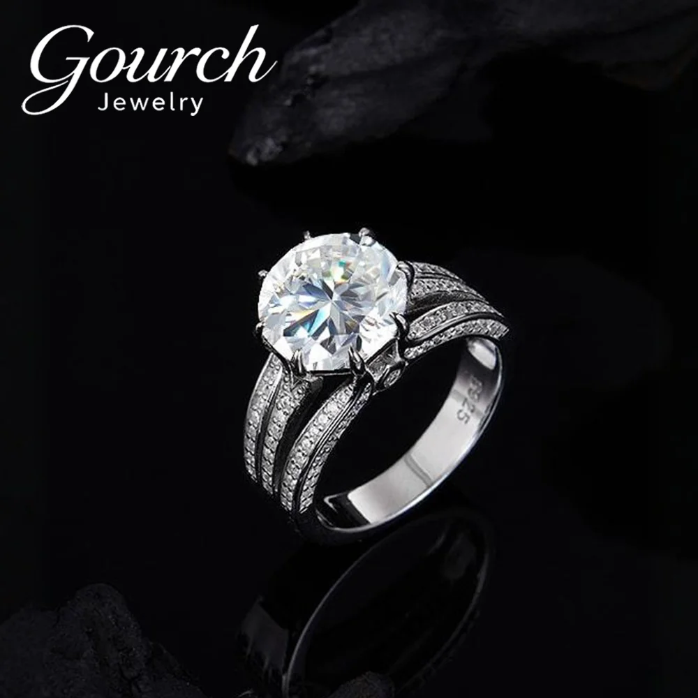 Кольцо Gourch D VVS1 круглой огранки с муассанитом 5 карат S925, серебро GRA, сверкающее роскошное модное ювелирное изделие на помолвку, подарок на день рождения для женщин
Кольцо Gourch D VVS1 круглой огранки с муассанитом 5 карат S925, серебро GRA, сверкающее роскошное модное ювелирное изделие на помолвку, подарок на день рождения для женщин