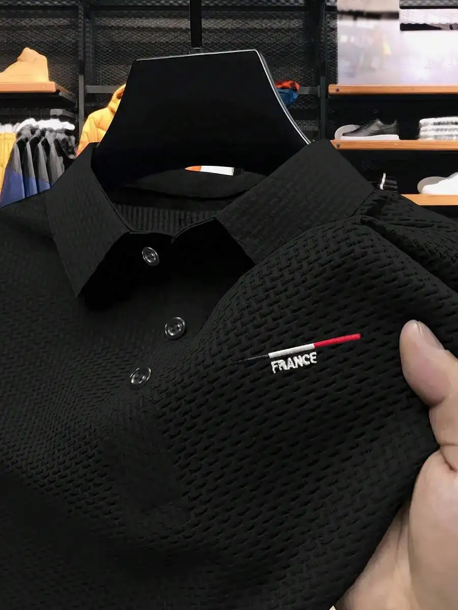 Black Textured Weave Polo Shirt with Flag Embroidery, Casual Business Fit
Black Textured Weave Polo Shirt with Flag Embroidery, Casual Business Fit
