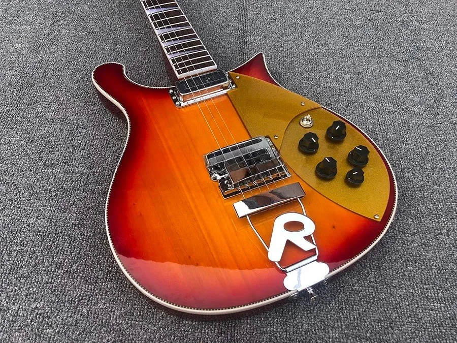 2026 новая высококачественная гитара с 6 струнами, вишневый цвет, золотая накладка, звукосниматель из 2 частей, 660,
2026 новая высококачественная гитара с 6 струнами, вишневый цвет, золотая накладка, звукосниматель из 2 частей, 660,