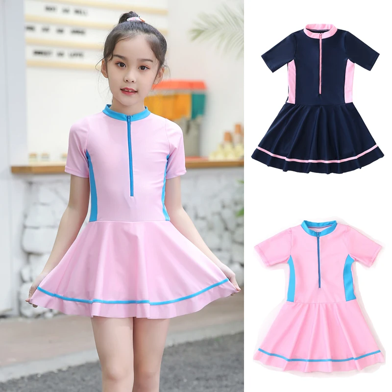 Girls One Piece Swimsuit Short Sleeve Zip Swimwear Summer Vacation Skirt with Built-in Shorts BeachWear Swim Dress Bathing Suits
Girls One Piece Swimsuit Short Sleeve Zip Swimwear Summer Vacation Skirt with Built-in Shorts BeachWear Swim Dress Bathing Suits