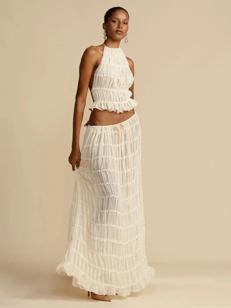 Fashion Women Summer Two Pieces Set Backless Halter Sleeveless Top Solid Maxi Skirt Set Female Pleated Long Skirt Holiday Outfit
Fashion Women Summer Two Pieces Set Backless Halter Sleeveless Top Solid Maxi Skirt Set Female Pleated Long Skirt Holiday Outfit