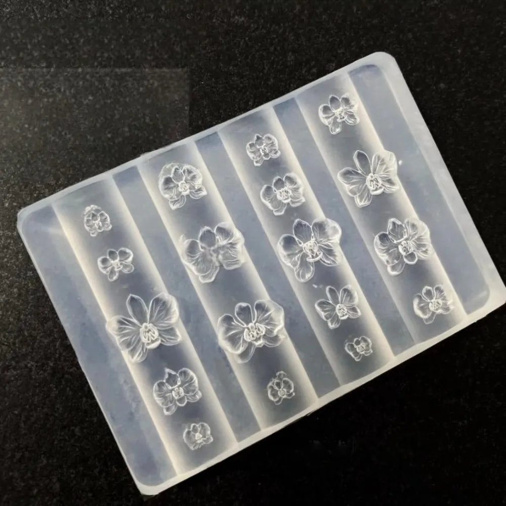 Silicone Nail Art Carving Template Flower Pattern Reusable 3D Phalaenopsis Flower Mold Carving Template Butterfly Orchid Design
Silicone Nail Art Carving Template Flower Pattern Reusable 3D Phalaenopsis Flower Mold Carving Template Butterfly Orchid Design