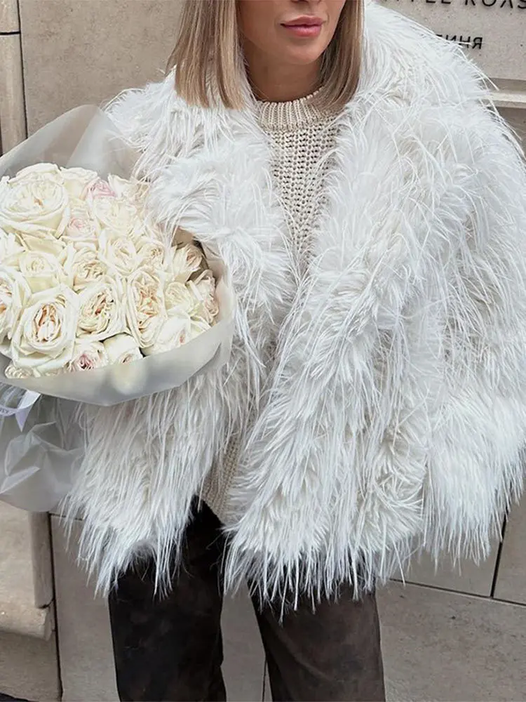 Luxury Brand Lapel Tassel Fluffy Fur Coats Women Autumn Winter Faux Fur Jacket Warm Design Long Sleeve Tops Loose Casual Coats
Luxury Brand Lapel Tassel Fluffy Fur Coats Women Autumn Winter Faux Fur Jacket Warm Design Long Sleeve Tops Loose Casual Coats