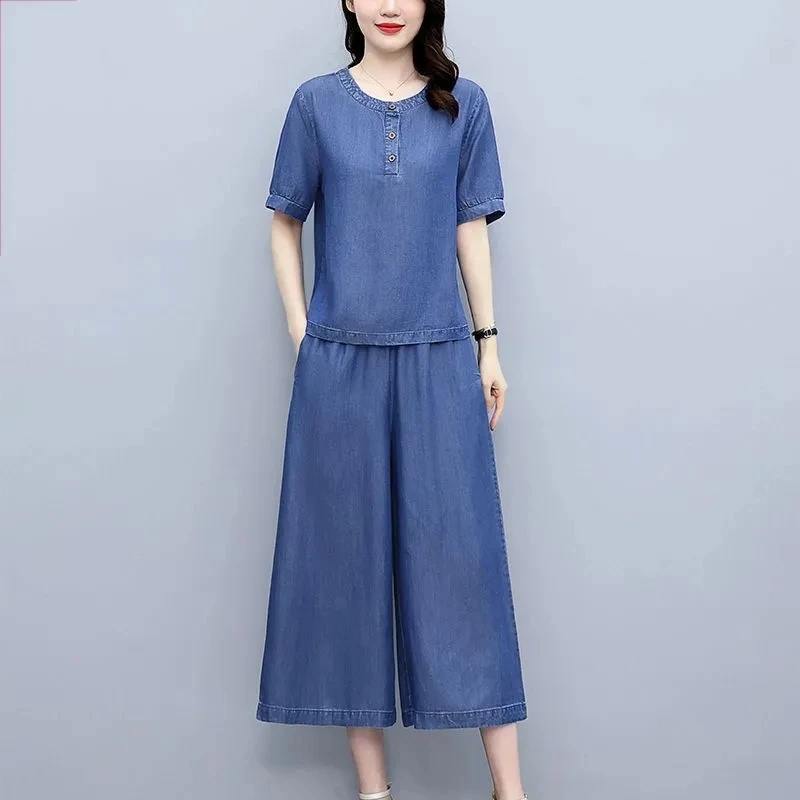 Summer Women Denim Sets 4XL Large Size Short Sleeve Pullover Tops + Elastic Waist Wide Leg Jeans 2PCS Casual Ladies Denim Suits
Summer Women Denim Sets 4XL Large Size Short Sleeve Pullover Tops + Elastic Waist Wide Leg Jeans 2PCS Casual Ladies Denim Suits