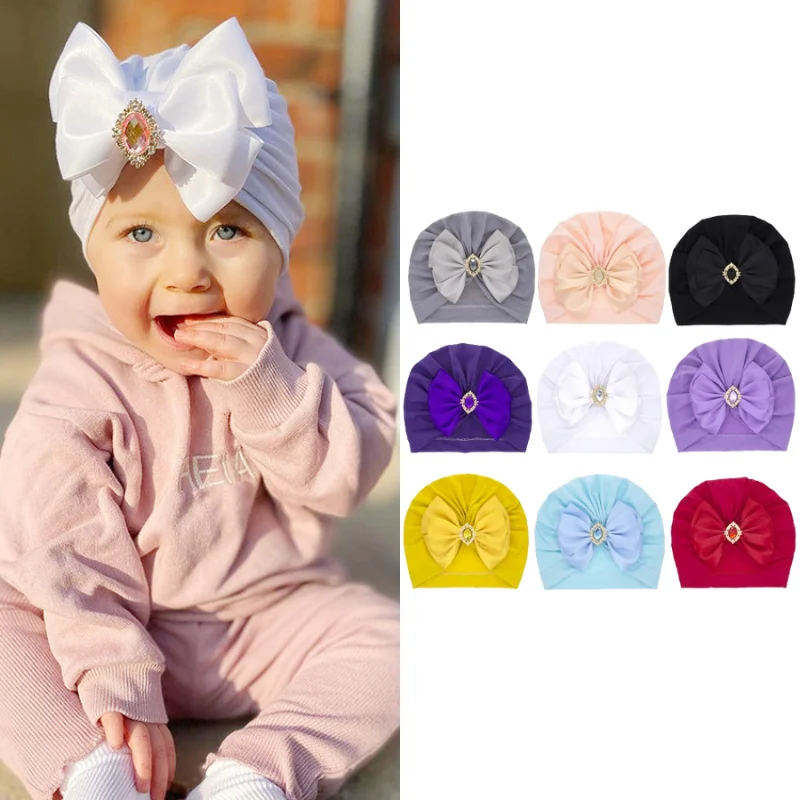 Baby Turban Headwrap with Big Bow Crystal Rhinestone Infant Cap Boho Chic Newborn Photography Prop Soft Cotton Girl Headband
Baby Turban Headwrap with Big Bow Crystal Rhinestone Infant Cap Boho Chic Newborn Photography Prop Soft Cotton Girl Headband
