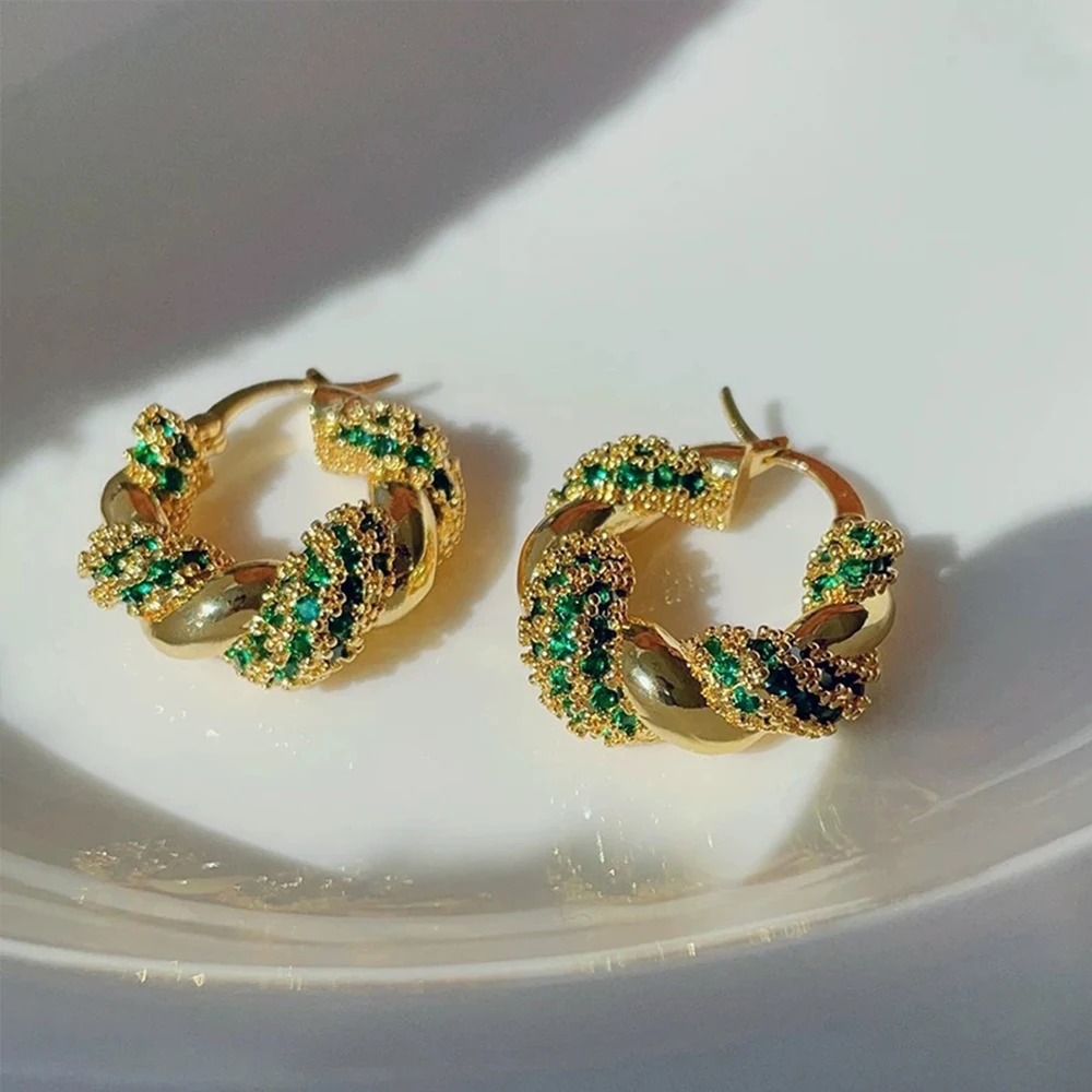 Vintage jewelry fashion Classic Luxury style Green circle 18K gold jewelry with Bohemian women's earrings ear buckle
Vintage jewelry fashion Classic Luxury style Green circle 18K gold jewelry with Bohemian women's earrings ear buckle