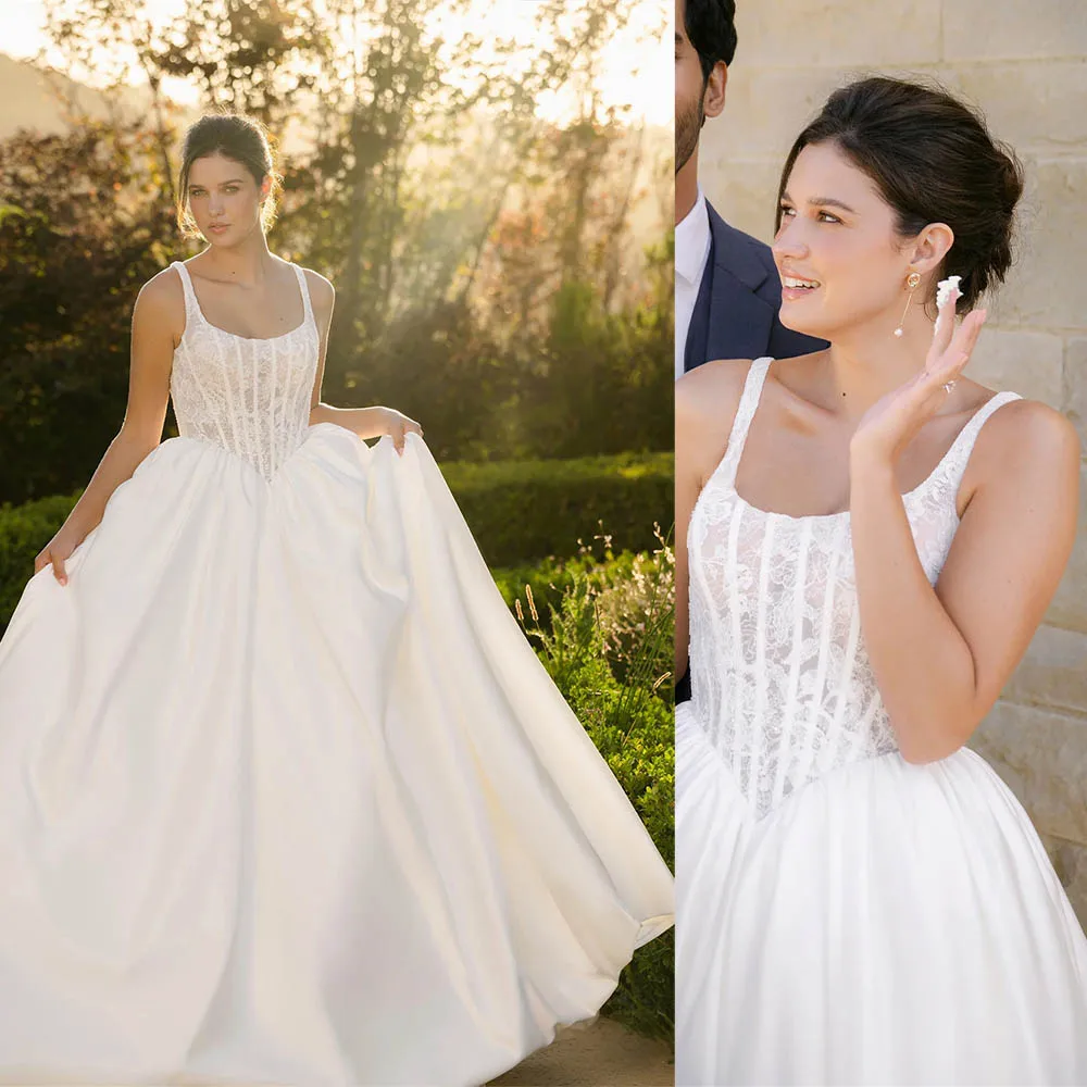 Очаровательные свадебные платья трапециевидной формы с двумя бретелями и овальным вырезом, кружевной аппликацией, свадебные платья на заказ, 2026 Rode De Morrie
Очаровательные свадебные платья трапециевидной формы с двумя бретелями и овальным вырезом, кружевной аппликацией, свадебные платья на заказ, 2026 Rode De Morrie