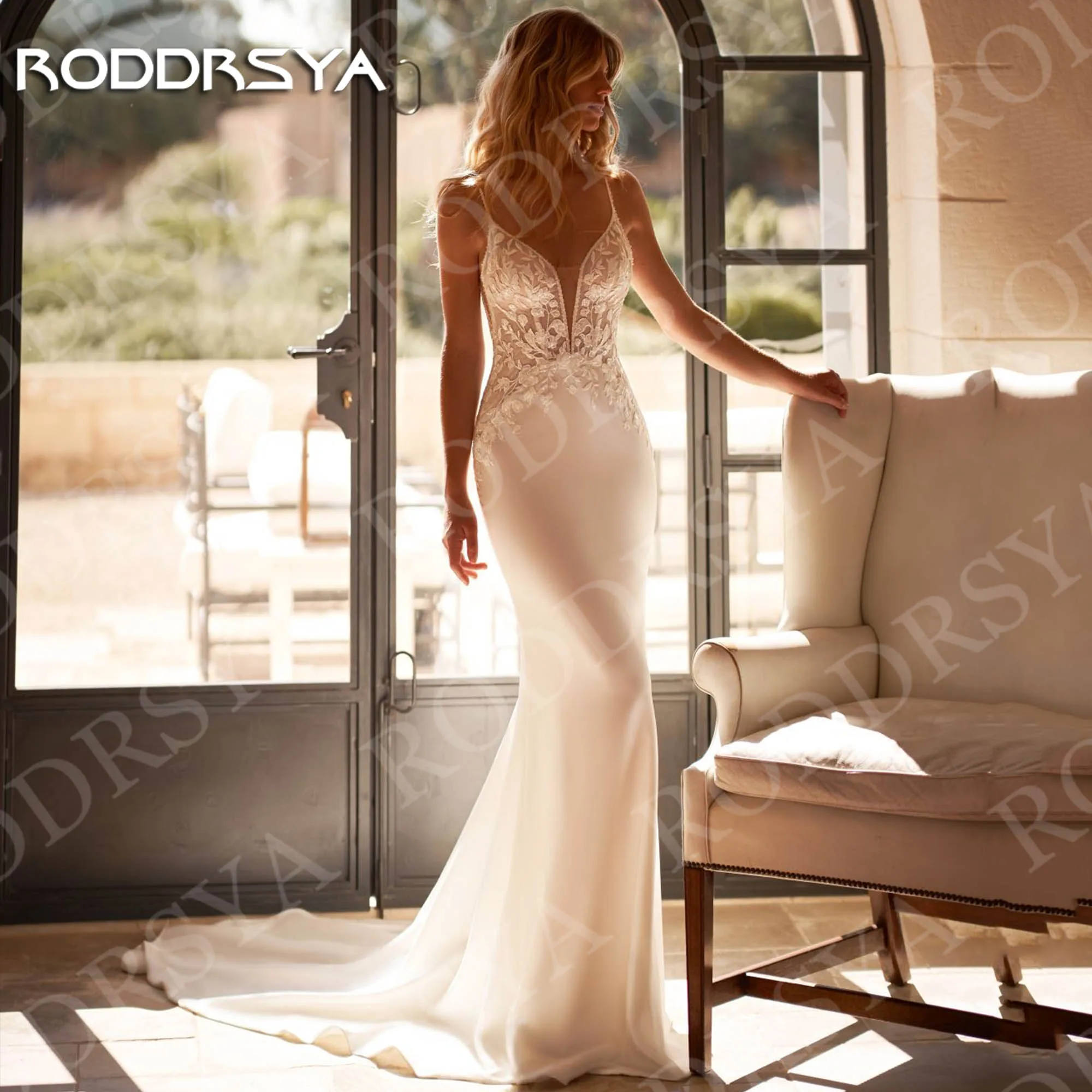 RODDRSYA Spaghetti Straps Wedding Dress V Neck Lace Appliques Mermaid Open Back Bride Gown Customized vestido de novia para boda
RODDRSYA Spaghetti Straps Wedding Dress V Neck Lace Appliques Mermaid Open Back Bride Gown Customized vestido de novia para boda