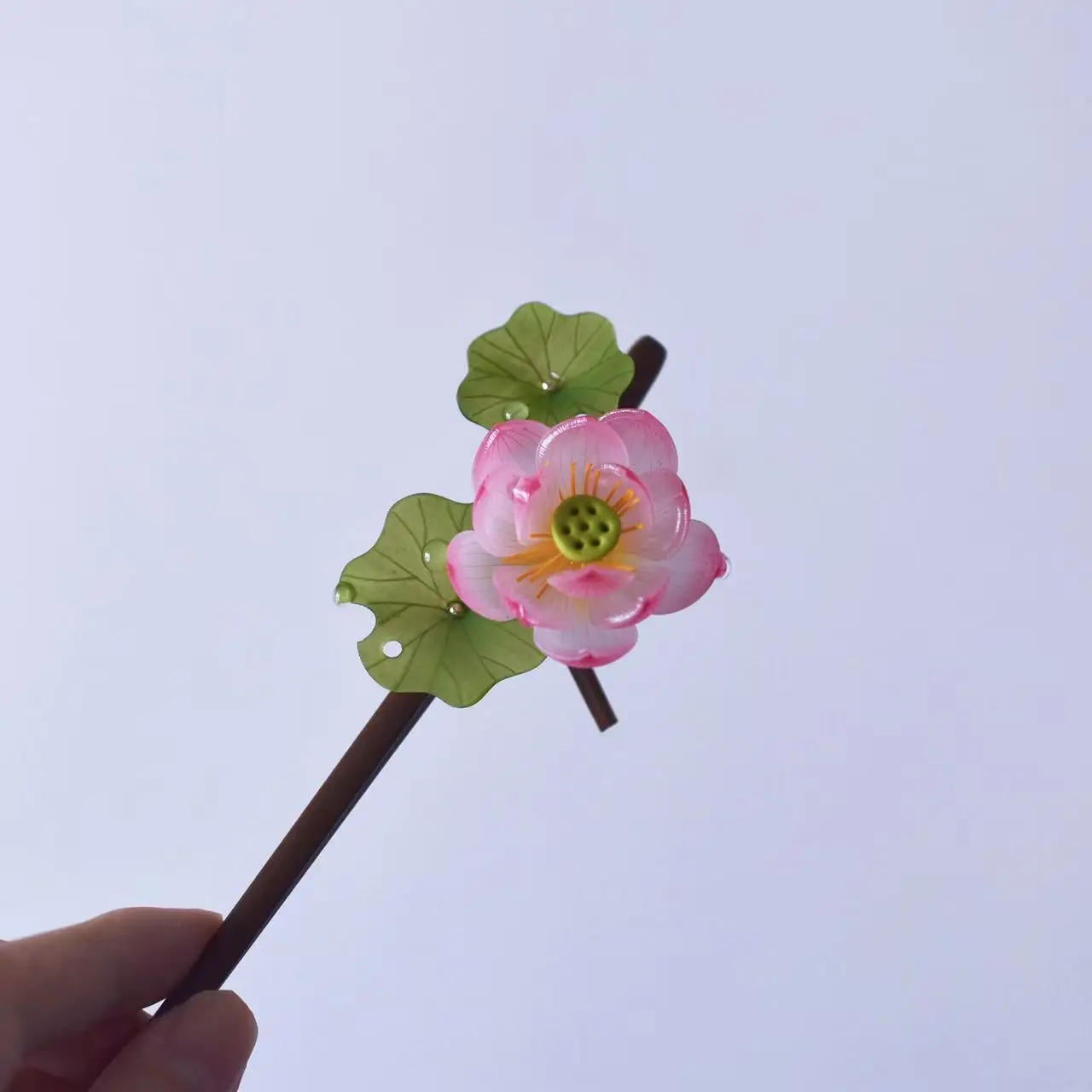 Lotus hairpin, vintage hair accessory, women's updo styling tool, vintage chopstick-style wooden hairpin / hair fork.
Lotus hairpin, vintage hair accessory, women's updo styling tool, vintage chopstick-style wooden hairpin / hair fork.