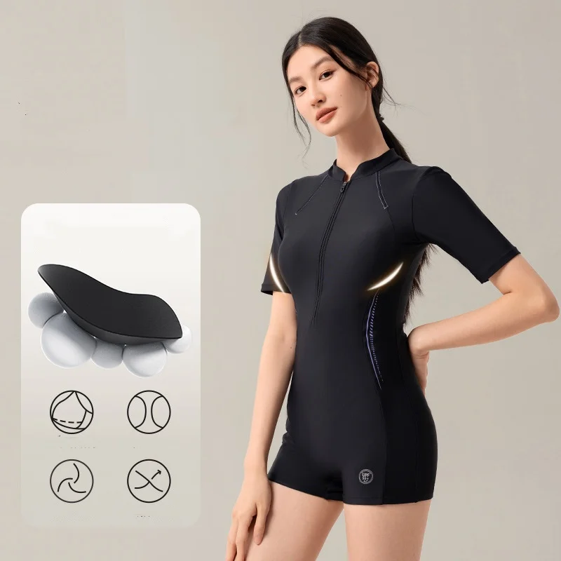 Женский цельный профессиональный быстросохнущий купальный костюм для серфинга с эффектом пуш-ап, передняя молния с коротким рукавом, водонепроницаемый спортивный пляжный купальник
Женский цельный профессиональный быстросохнущий купальный костюм для серфинга с эффектом пуш-ап, передняя молния с коротким рукавом, водонепроницаемый спортивный пляжный купальник