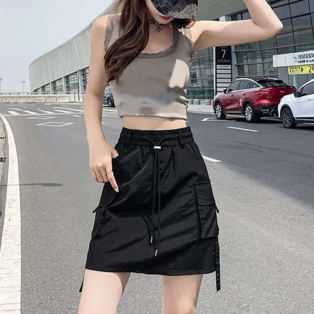 Solid Color Loose High Waist Skirt Drawstring Large Pocket Wide Half Leg Skirts Spicy Girl Style Lace Up Cargo Skirts Streetwear
Solid Color Loose High Waist Skirt Drawstring Large Pocket Wide Half Leg Skirts Spicy Girl Style Lace Up Cargo Skirts Streetwear