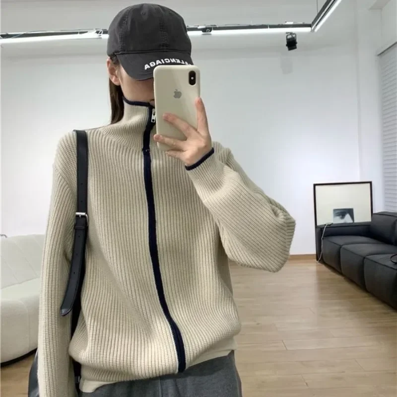 Pop Fashion Casual Zipper Turtleneck Cashmere Cardigan Women's Autumn And Winter Loose Sweater Knitted Wool Top
Pop Fashion Casual Zipper Turtleneck Cashmere Cardigan Women's Autumn And Winter Loose Sweater Knitted Wool Top
