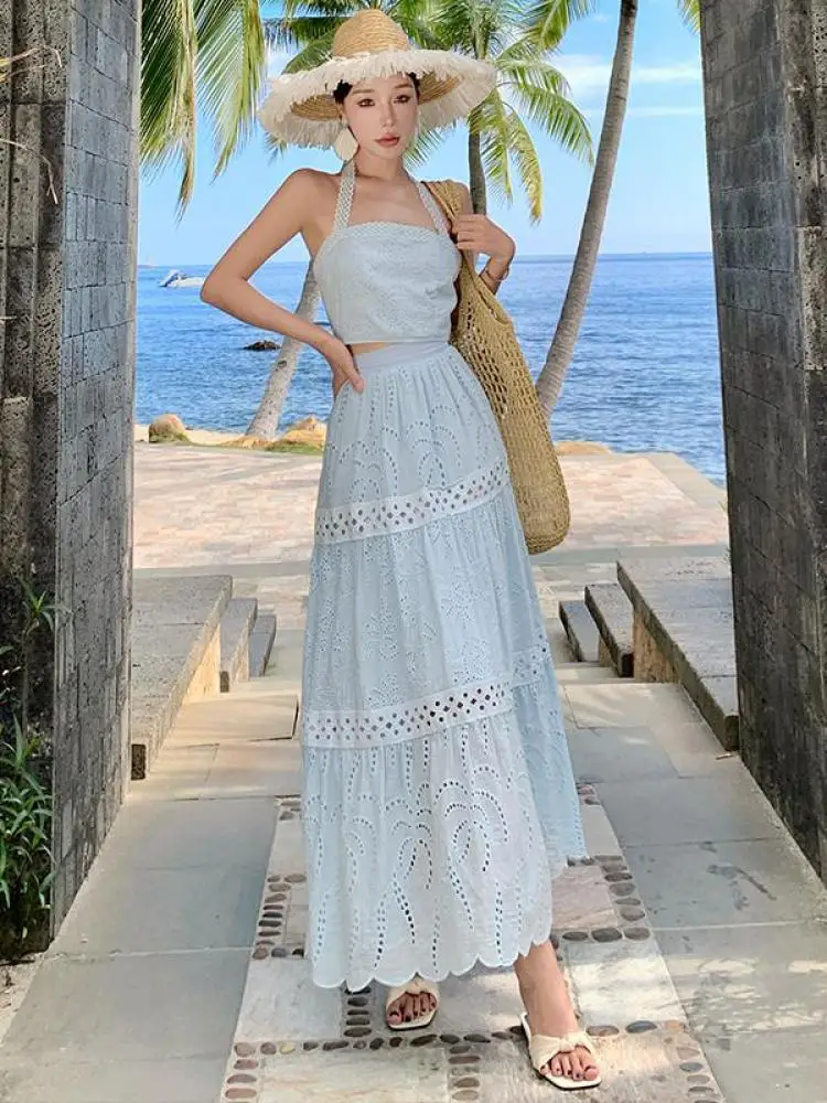 Summer Women Vacation Loose Two Piece Set Blue Sleeveless Backless Halter Tops And High Waist Hollowed Out Pleated Long Skirts
Summer Women Vacation Loose Two Piece Set Blue Sleeveless Backless Halter Tops And High Waist Hollowed Out Pleated Long Skirts