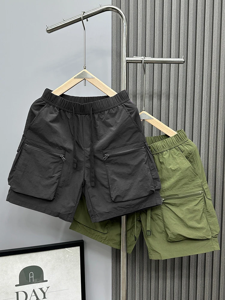 Summer Thin Outdoor Workwear orts Men's Casual Loose Five-Point Pants Qui Dry Outerwear ket Zipper Breathable Mid-Pants
Summer Thin Outdoor Workwear orts Men's Casual Loose Five-Point Pants Qui Dry Outerwear ket Zipper Breathable Mid-Pants