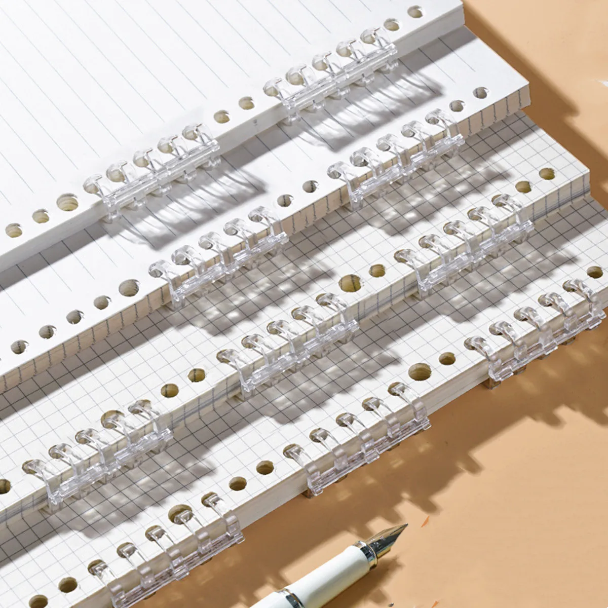 5 transparent white five-hole loose-leaf rings, DIY detachable loose-leaf buckles segmented plastic loose-leaf paper binding rings
5 transparent white five-hole loose-leaf rings, DIY detachable loose-leaf buckles segmented plastic loose-leaf paper binding rings