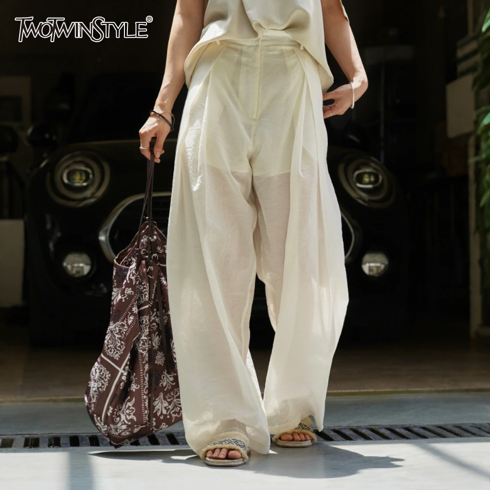 TWOTWINSTYLE Beige Spliced Fold Folded Female Trousers Hight Waist Loose Temprament Basics Women's Pant Summer New Style Fashion
TWOTWINSTYLE Beige Spliced Fold Folded Female Trousers Hight Waist Loose Temprament Basics Women's Pant Summer New Style Fashion
