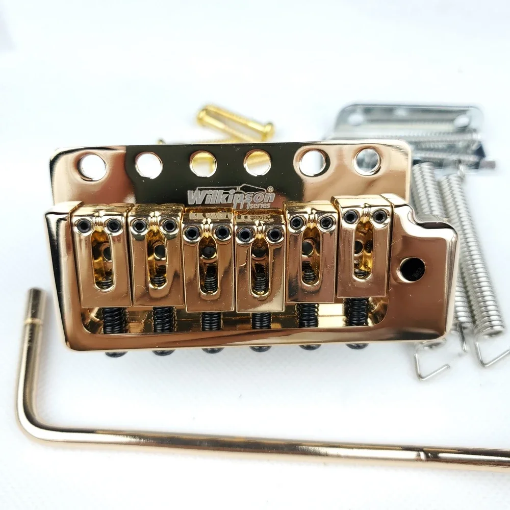 Электрогитара Wilkinson с фиксированным 6 винтами ST Tremolo Vibrato Bridge Gold WOV09
Электрогитара Wilkinson с фиксированным 6 винтами ST Tremolo Vibrato Bridge Gold WOV09