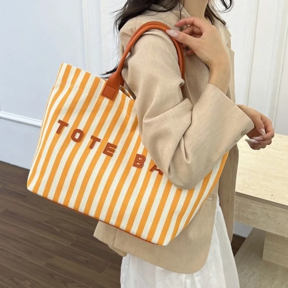 Portable Large Capacity Striped Canvas Tote Bag Canvas Striped Shoulder Bag Magnetic Snap Lightweight Women's Handbag Fitness
Portable Large Capacity Striped Canvas Tote Bag Canvas Striped Shoulder Bag Magnetic Snap Lightweight Women's Handbag Fitness