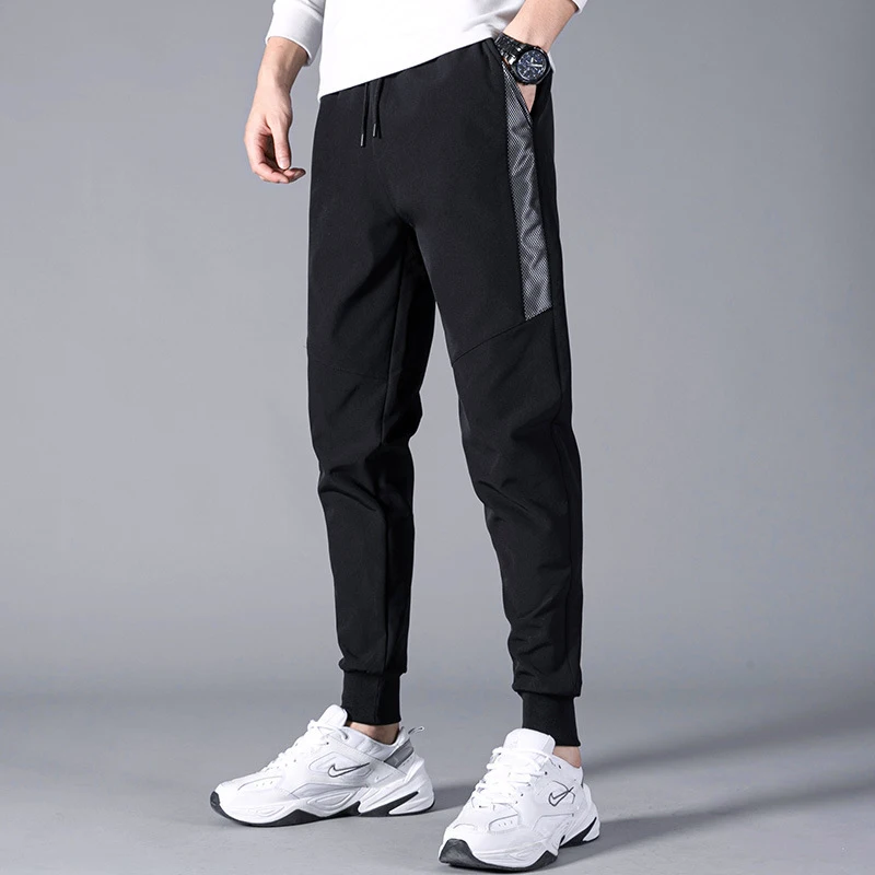 Men's Casual Stretch Sports Pants Loose Quick Dry Cropped Leg Tied Sweatpants Spring Autumn Patchwork Comfortable Men's Pants
Men's Casual Stretch Sports Pants Loose Quick Dry Cropped Leg Tied Sweatpants Spring Autumn Patchwork Comfortable Men's Pants