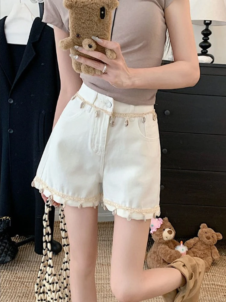 Tassel ethnic style high waisted denim shorts for women in summer 2025 new loose and slim casual versatile wide leg pants
Tassel ethnic style high waisted denim shorts for women in summer 2025 new loose and slim casual versatile wide leg pants
