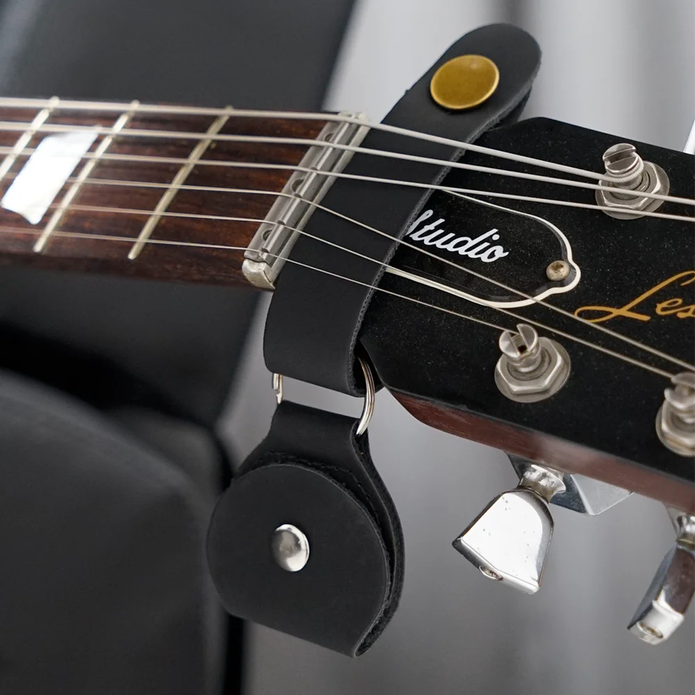 Leather Guitar Pick Holder - Clip-on Headstock Pouch for Acoustic Electric Guitar Bass
Leather Guitar Pick Holder - Clip-on Headstock Pouch for Acoustic Electric Guitar Bass
