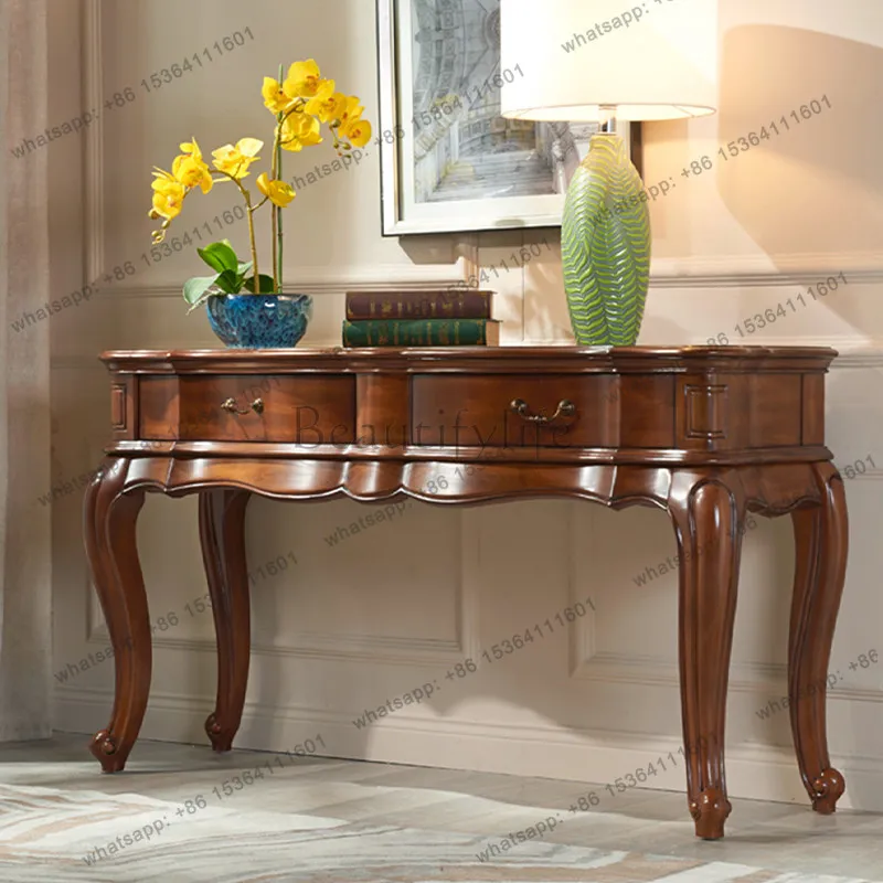 Вход в гостиную, входной столик из цельного дерева, декоративная спинка дивана, несколько европейских легких роскошных коробок
Вход в гостиную, входной столик из цельного дерева, декоративная спинка дивана, несколько европейских легких роскошных коробок