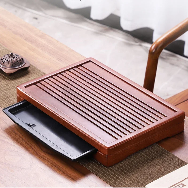 Household Solid Wood Rosewood Small Rectangular Tea Tray Kung-Fu Set Bamboo Table Water Storage Type Drawer
Household Solid Wood Rosewood Small Rectangular Tea Tray Kung-Fu Set Bamboo Table Water Storage Type Drawer
