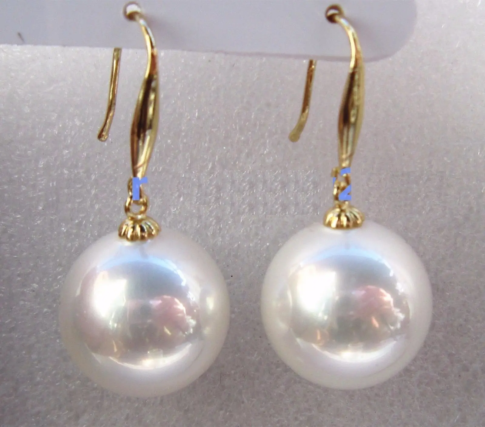 12mm White Round South Sea Shell Pearl 14K Gold Plated Earrings AAA
12mm White Round South Sea Shell Pearl 14K Gold Plated Earrings AAA