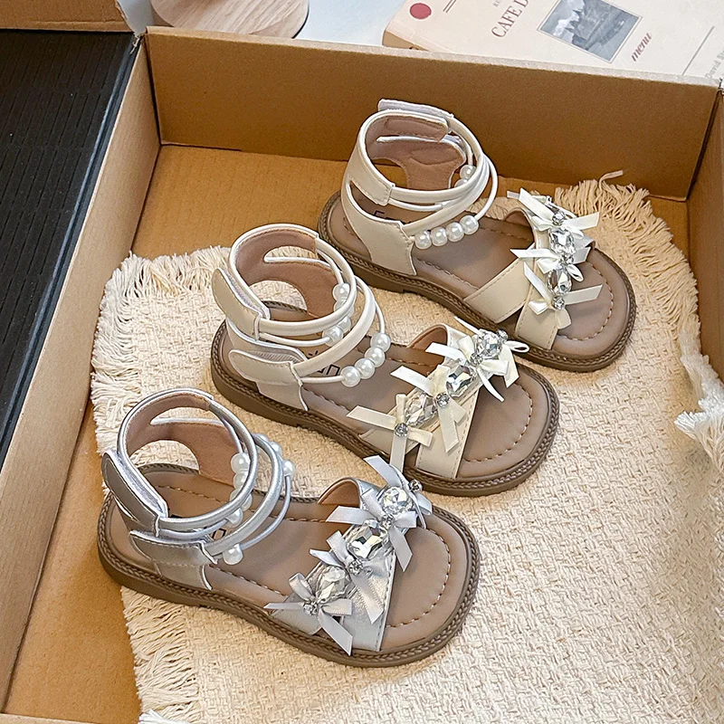 Mumoresip Girl Gladiator Sandals Summer Princess Non Slip Children Flat Sandals Pearl Bow Rhinestone High-top Kids Roman Sandals
Mumoresip Girl Gladiator Sandals Summer Princess Non Slip Children Flat Sandals Pearl Bow Rhinestone High-top Kids Roman Sandals