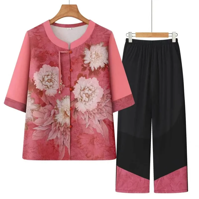 Middle-aged Mom Round Neck Trousers 2PCS Summer Femme Printed Tops Wide Leg Pants Two-piece Set Spring Lady Large Size 5XL Suit
Middle-aged Mom Round Neck Trousers 2PCS Summer Femme Printed Tops Wide Leg Pants Two-piece Set Spring Lady Large Size 5XL Suit
