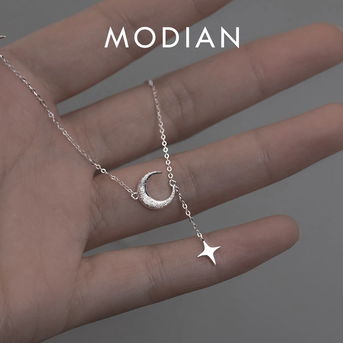 MODIAN из стерлингового серебра 925 пробы, изысканное ожерелье с подвеской в виде луны для женщин, простая цепочка со звездой, колье с платиновым покрытием, ювелирные изделия, подарок
MODIAN из стерлингового серебра 925 пробы, изысканное ожерелье с подвеской в виде луны для женщин, простая цепочка со звездой, колье с платиновым покрытием, ювелирные изделия, подарок