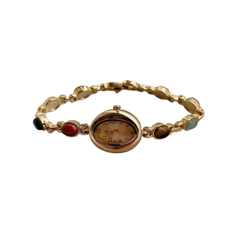 Colored stone bracelet watch Small and exquisite oval high-value women's gift quartz watch
Colored stone bracelet watch Small and exquisite oval high-value women's gift quartz watch