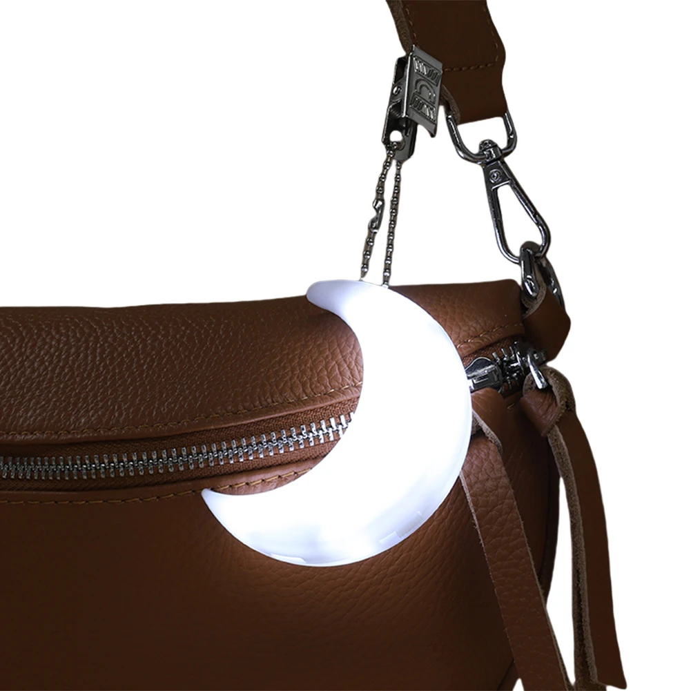 Moon Shape Handbag Light with Automatic Sensor Mini LED Bag Light with Clip Handbag Touch Lamp Bag Accessories
Moon Shape Handbag Light with Automatic Sensor Mini LED Bag Light with Clip Handbag Touch Lamp Bag Accessories